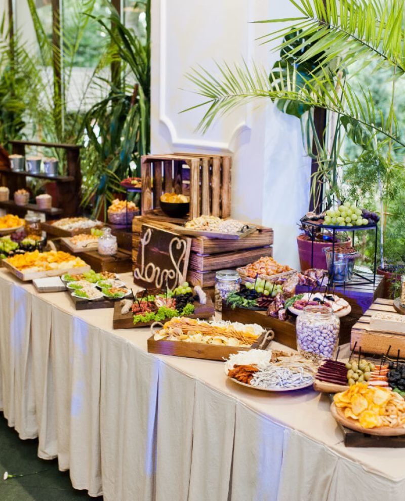 dessert-table-of-delicious-snacks-on-wedding-recep-T8JK3GX.jpg